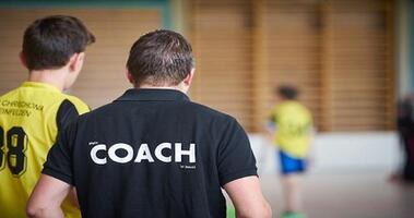 How do a coach’s expectations influence an athlete’s development?